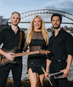 Making Moves trio with guitar, drumsticks and trumpet by Sydney Harbour