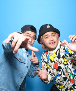 Kamura Duo DJs posing against a blue background