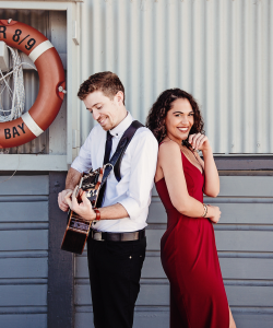 Ned Verwey Band duo with acoustic guitar and singer in a red dress